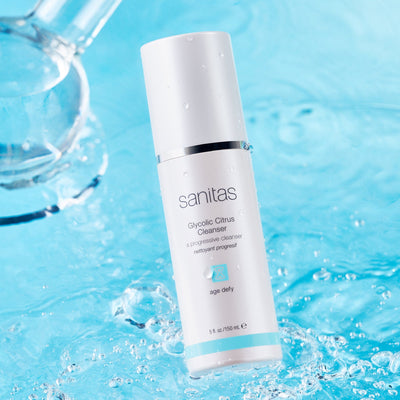glycolic citrus cleanser with blue background in water