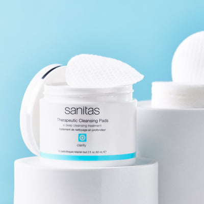 therapeutic cleansing pads on white riser