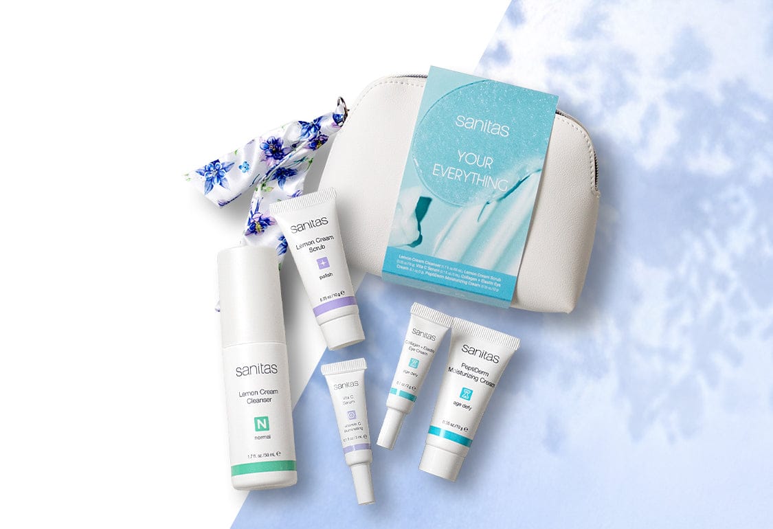 Santas Your Everything skincare product set with a white bag on a light blue background